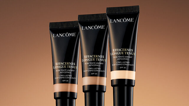 Corrector facial Lancome, resaltando su capacidad para ocultar imperfecciones y lograr un cutis impecable en un formato movil.