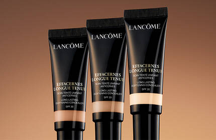 Corrector facial Lancome, resaltando su capacidad para ocultar imperfecciones y lograr un cutis impecable en un formato movil.