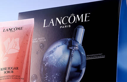 Productos para el cuidado de la piel Lancome, incluyendo mascarillas y exfoliantes, presentados en un diseno minimalista y moderno.