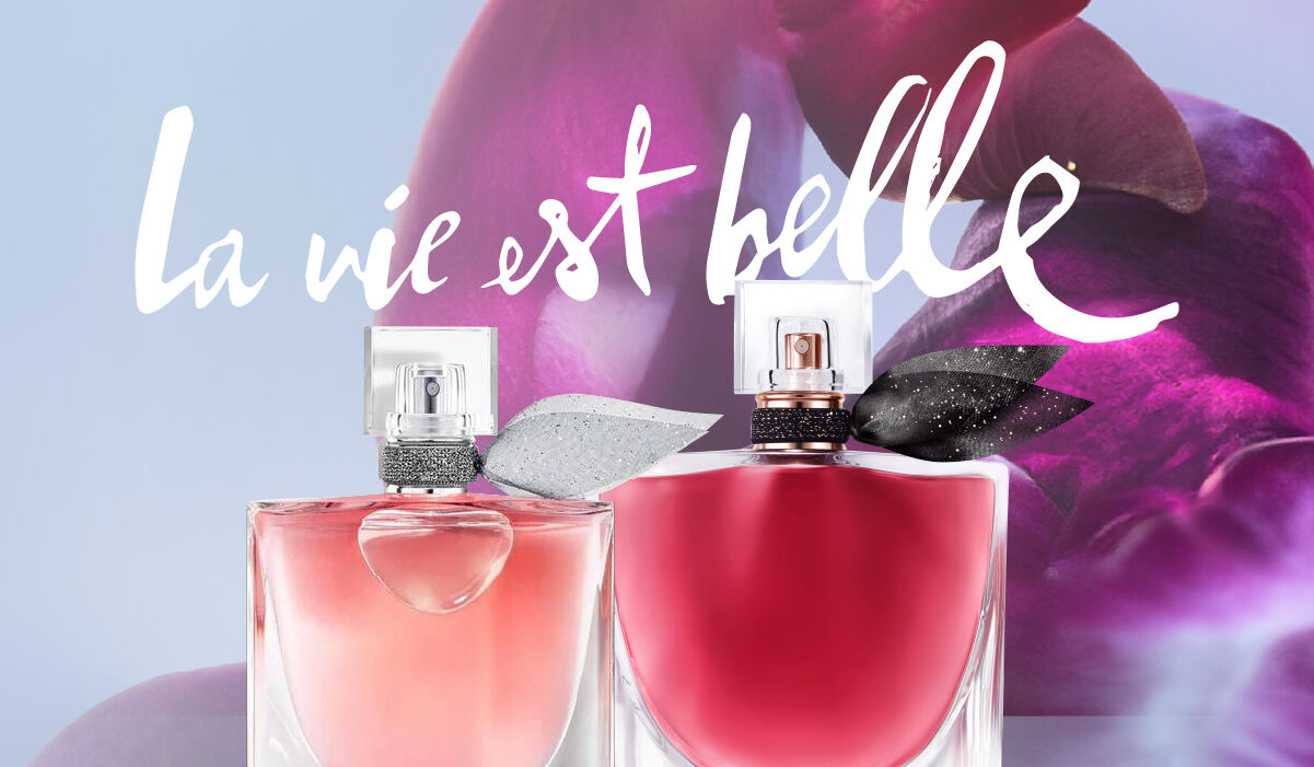 Banner promocional de Lanc\o\me con una modelo sosteniendo un producto de la linea L'Absolu Rouge.