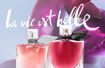 Banner promocional de Lanc\o\me con una modelo sosteniendo un producto de la linea L'Absolu Rouge.