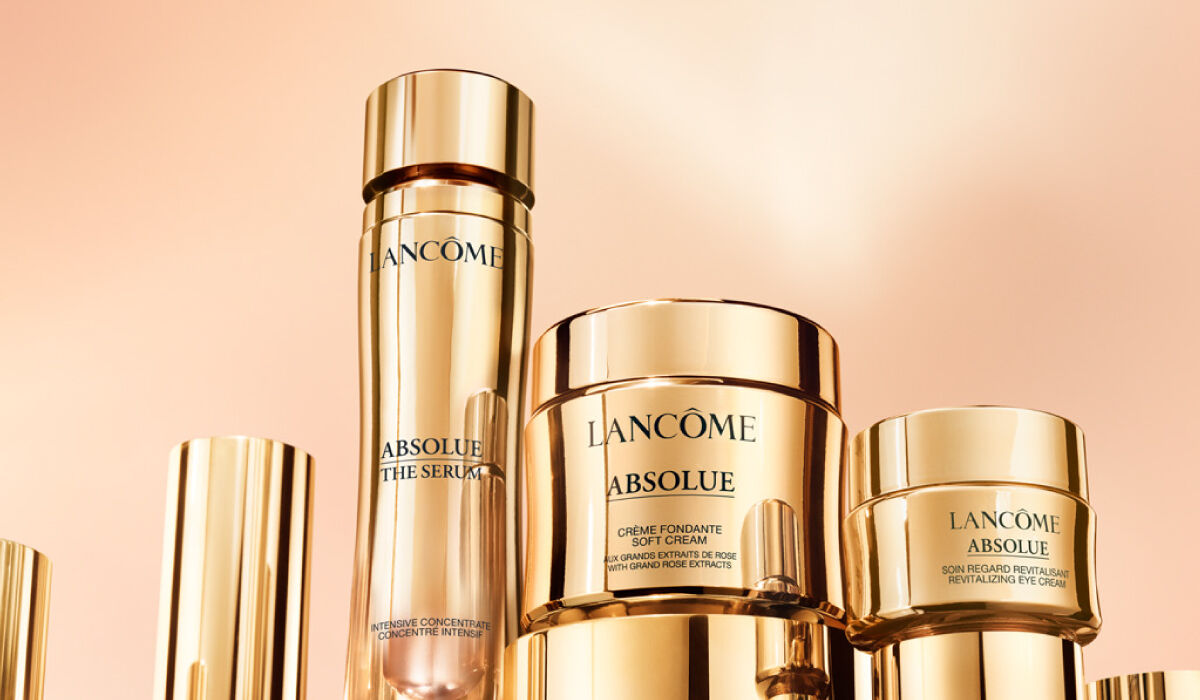 Banner promocional de la linea Absolue de Lancome, presentando productos de lujo para el cuidado de la piel en un diseno elegante.