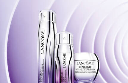 Banner promocional de la linea Renergie de Lancome, presentando una gama de productos para el cuidado de la piel en un diseno moderno.