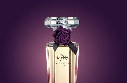 Perfume Lancome Tresor Midnight Rose, presentado en una imagen con un tono calido y romantico.